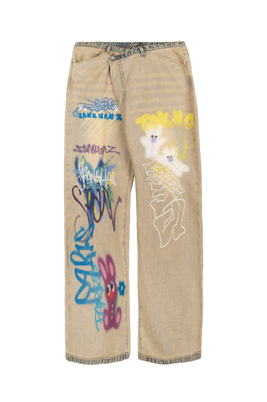 BUMPY GRAFFITI PRINT REVERSIBLE FABRIC ASYMMETRICAL DENIM PANTS